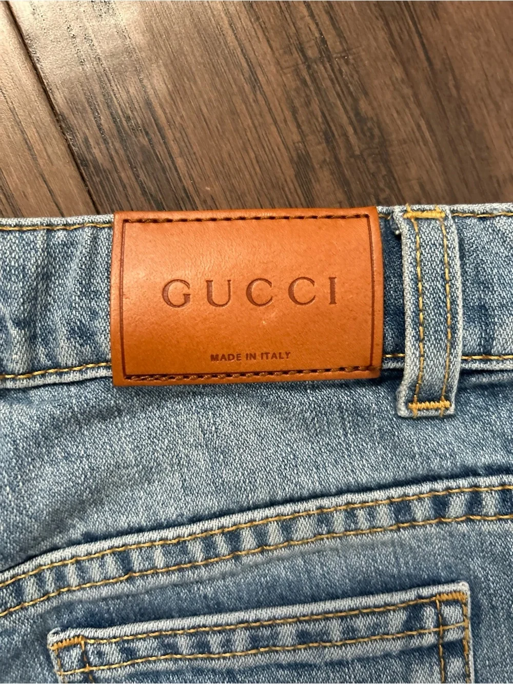 Gucci Light Blue Denim Jeans with Tan Leather Patch
